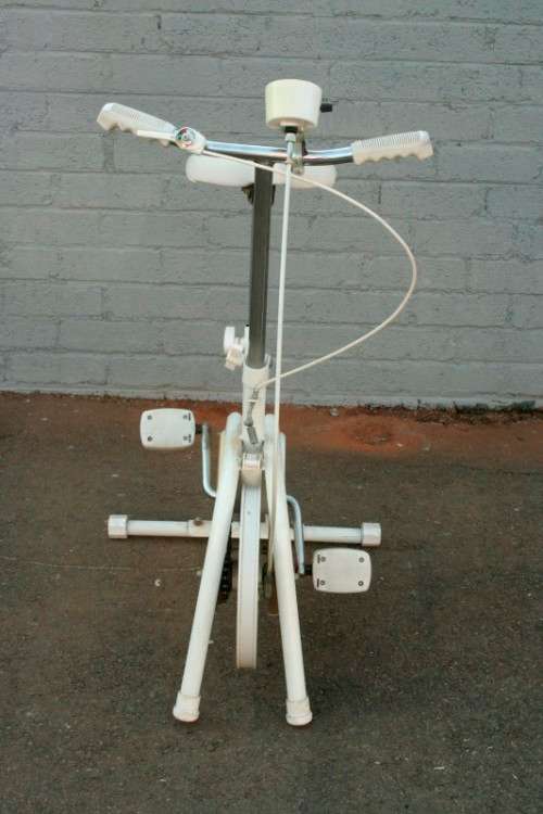 A fabulous vintage "Health Master" Ex-100 stationary bicycle with tension adjuster & speedometer