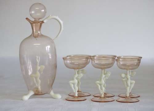 A spectacular antique Art Deco Bimini & Lauscha lampwork decanter set with milk glass "nude" stems