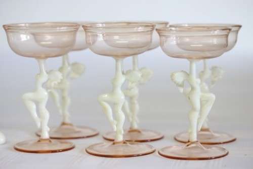 A spectacular antique Art Deco Bimini & Lauscha lampwork decanter set with milk glass "nude" stems