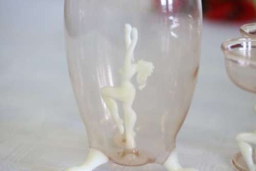A spectacular antique Art Deco Bimini & Lauscha lampwork decanter set with milk glass "nude" stems