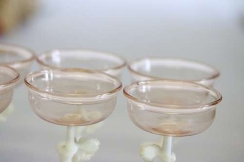 A spectacular antique Art Deco Bimini & Lauscha lampwork decanter set with milk glass "nude" stems