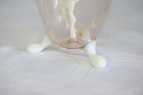A spectacular antique Art Deco Bimini & Lauscha lampwork decanter set with milk glass "nude" stems