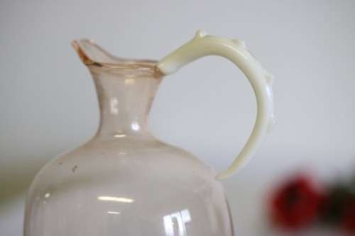 A spectacular antique Art Deco Bimini & Lauscha lampwork decanter set with milk glass "nude" stems