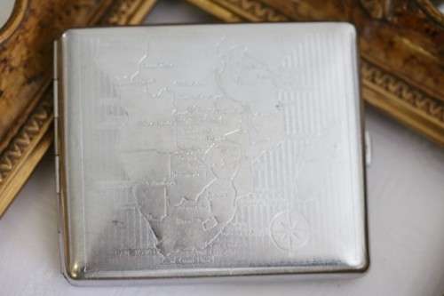 An awesome vintage "Retro" chrome plated cigarette holder with the map of Southern Africa pre 1975