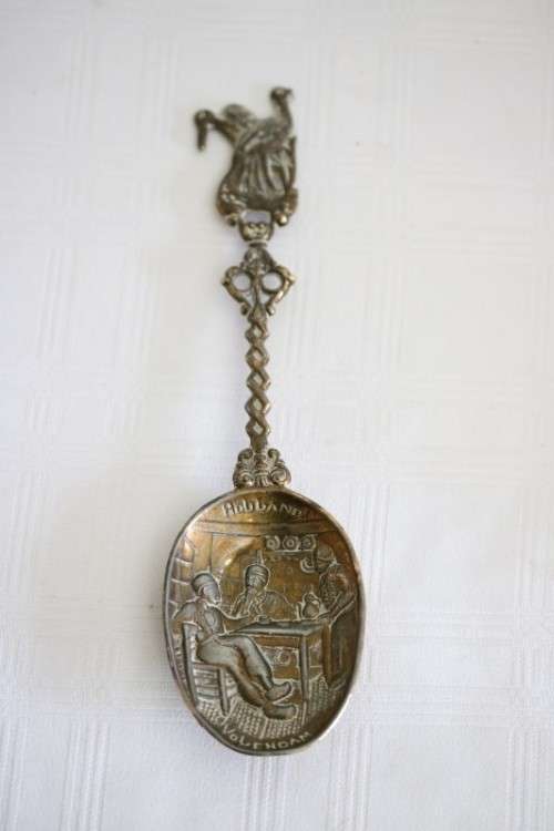 **RS17** Rare antique German made brass plated pewter figural spoon w/ a traditional Dutch pub scene