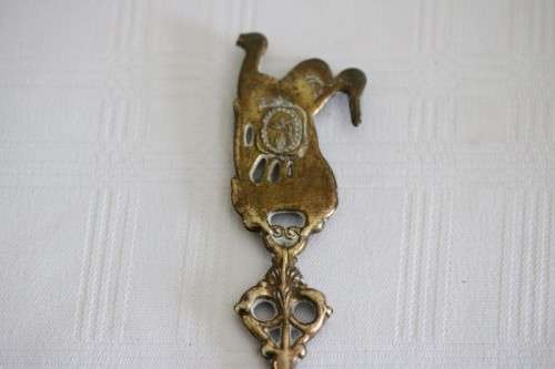 **RS17** Rare antique German made brass plated pewter figural spoon w/ a traditional Dutch pub scene