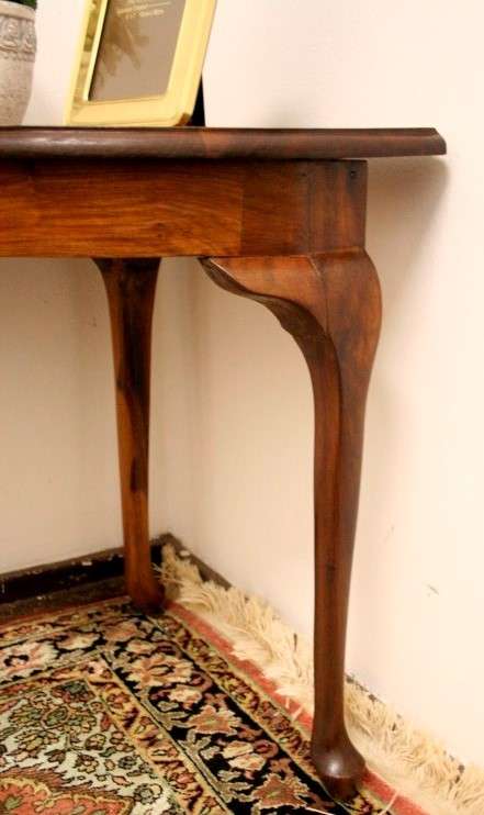A wonderful vintage solid Teak corner occasional table with Queen Anne legs in great condition