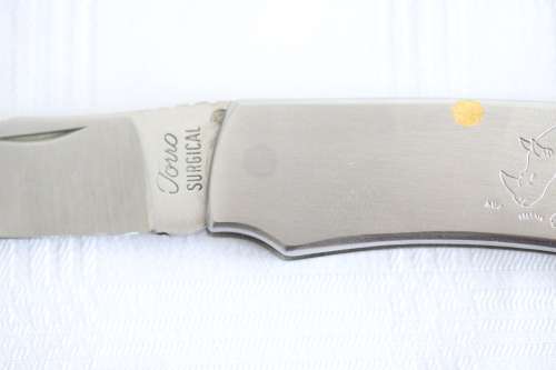 An awesome "surgical steel" Torro folding pocket knife in very good condition - very practical!!