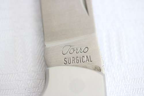 An awesome "surgical steel" Torro folding pocket knife in very good condition - very practical!!
