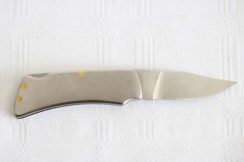 An awesome "surgical steel" Torro folding pocket knife in very good condition - very practical!!