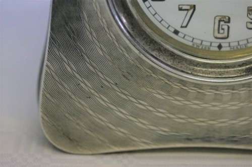 A spectacularly rare antique (1911) Hallmarked sterling silver travel clock w/ a Brevet 33236 watch