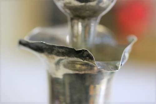 An incredible antique 3-sided 900 solid silver overlay decanter and stopper with a dragon motif