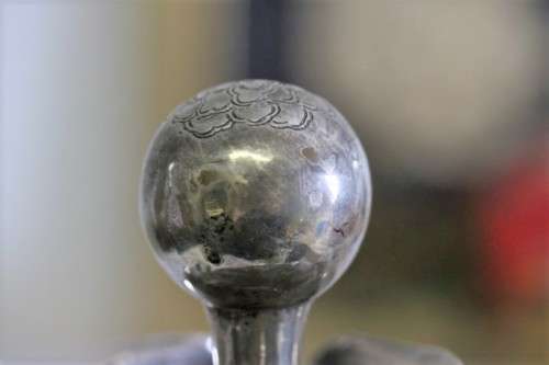 An incredible antique 3-sided 900 solid silver overlay decanter and stopper with a dragon motif