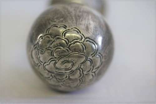An incredible antique 3-sided 900 solid silver overlay decanter and stopper with a dragon motif