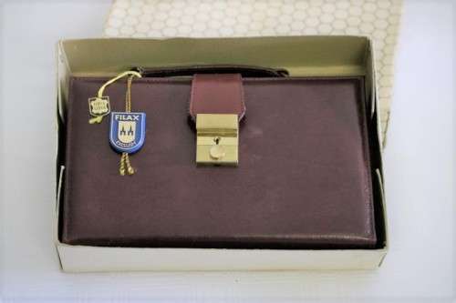 An incredible German made Filax gold plated "Solingen" manicure set in a genuine leather case
