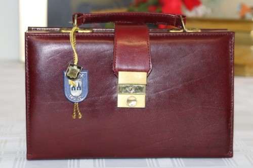 An incredible German made Filax gold plated "Solingen" manicure set in a genuine leather case