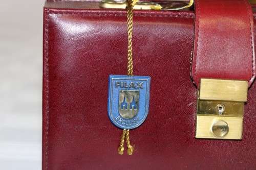 An incredible German made Filax gold plated "Solingen" manicure set in a genuine leather case