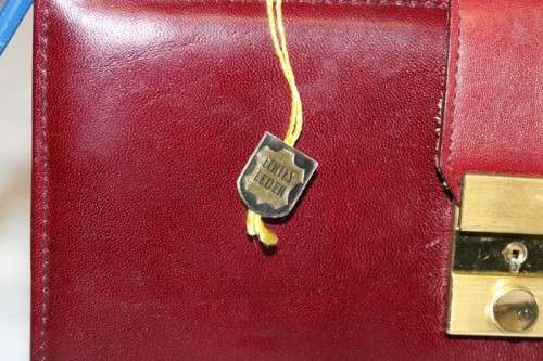 An incredible German made Filax gold plated "Solingen" manicure set in a genuine leather case