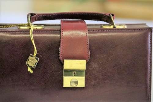 An incredible German made Filax gold plated "Solingen" manicure set in a genuine leather case