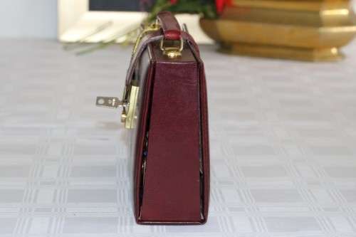 An incredible German made Filax gold plated "Solingen" manicure set in a genuine leather case