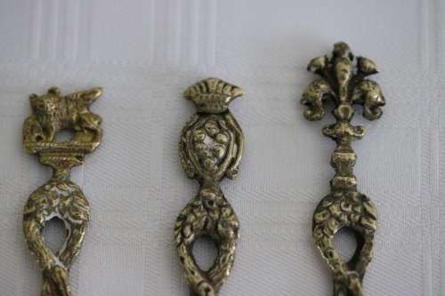 A very rare antique ornate Alpak of Italy silver plated (on brass) teaspoon set with different decal