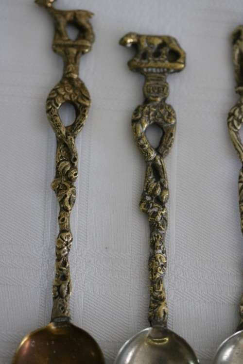 A very rare antique ornate Alpak of Italy silver plated (on brass) teaspoon set with different decal