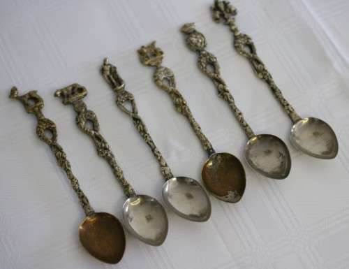 A very rare antique ornate Alpak of Italy silver plated (on brass) teaspoon set with different decal