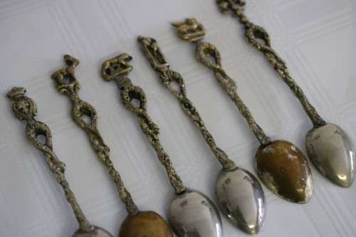 A very rare antique ornate Alpak of Italy silver plated (on brass) teaspoon set with different decal