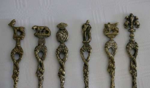 A very rare antique ornate Alpak of Italy silver plated (on brass) teaspoon set with different decal