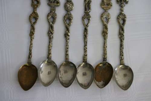 A very rare antique ornate Alpak of Italy silver plated (on brass) teaspoon set with different decal