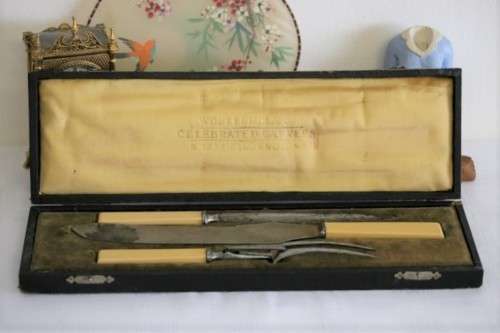 A stunning antique British made Wostenholm's "Celebrated Carver" boxed carving knife, fork & steel