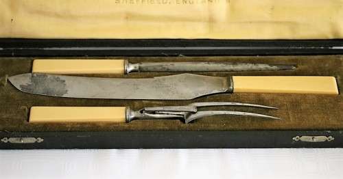 A stunning antique British made Wostenholm's "Celebrated Carver" boxed carving knife, fork & steel