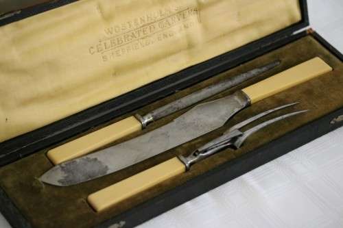 A stunning antique British made Wostenholm's "Celebrated Carver" boxed carving knife, fork & steel