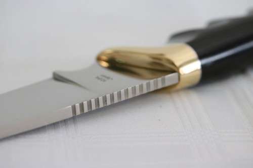 A fantastic high-quality Kershaw 1034 "Elk Hunter" knife with its original box and sheath!!