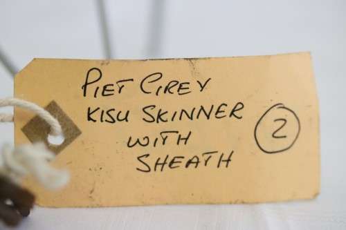 An awesome Piet Cirey "skinning" knife with brass trimmings in its original leather sheath