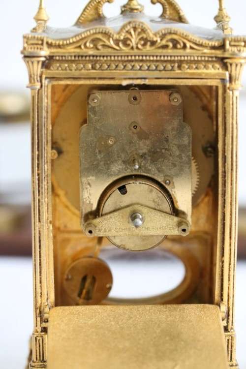 An amazing vintage mid-century German made "Schmid Schlenker" ornate mantle carriage clock