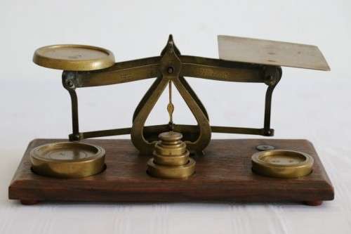 A rare antique British made Victorian brass postal scale w/ solid brass weights in amazing condition