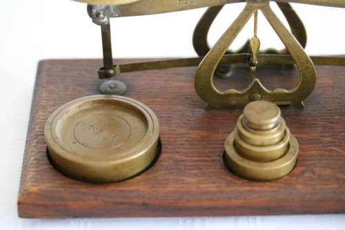 A rare antique British made Victorian brass postal scale w/ solid brass weights in amazing condition