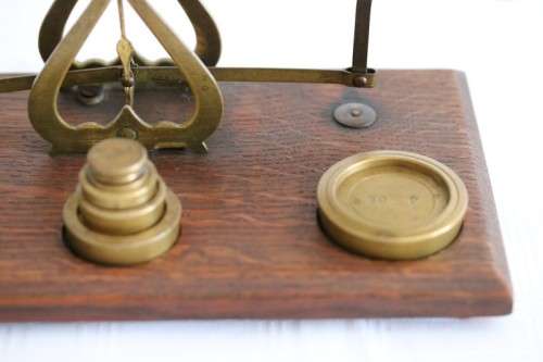 A rare antique British made Victorian brass postal scale w/ solid brass weights in amazing condition