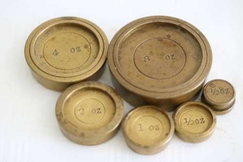 A rare antique British made Victorian brass postal scale w/ solid brass weights in amazing condition