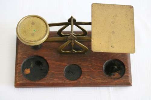 A rare antique British made Victorian brass postal scale w/ solid brass weights in amazing condition