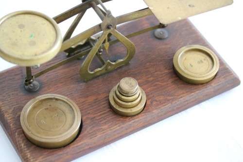 A rare antique British made Victorian brass postal scale w/ solid brass weights in amazing condition
