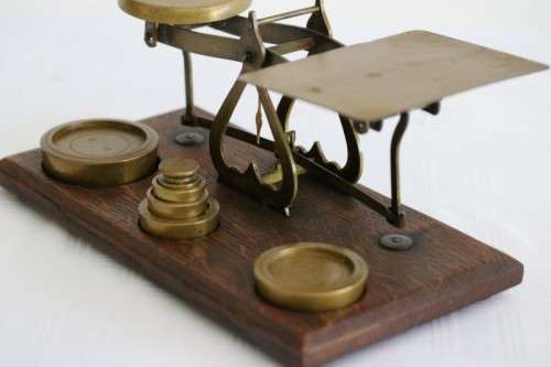 A rare antique British made Victorian brass postal scale w/ solid brass weights in amazing condition