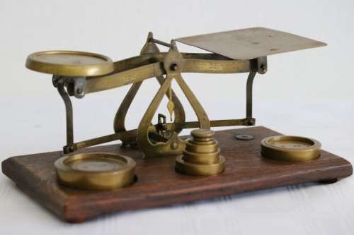 A rare antique British made Victorian brass postal scale w/ solid brass weights in amazing condition