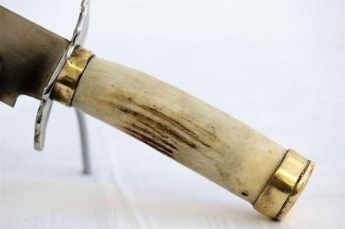 A magnificent hand made in Ecuador TEMPERED STEEL hunting knife in in its original leather sheath!!