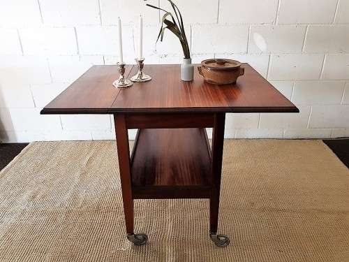 A charming RETRO solid wooden drop-leaf drinks trolley on its original castors in great condition