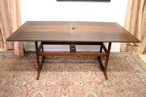 A fabulous modern slatted Teak 6-seater patio/garden set including six cushions.