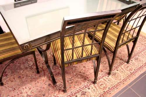 Make an offer! Quality 6-seater wrought iron patio table w 6 upholstered chairs. Summer is here!!!