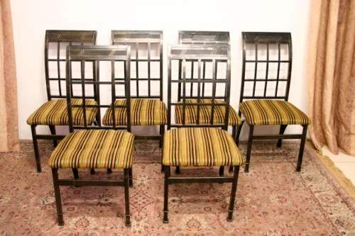 Make an offer! Quality 6-seater wrought iron patio table w 6 upholstered chairs. Summer is here!!!