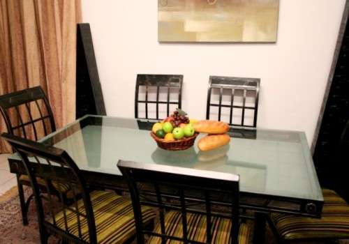 Make an offer! Quality 6-seater wrought iron patio table w 6 upholstered chairs. Summer is here!!!